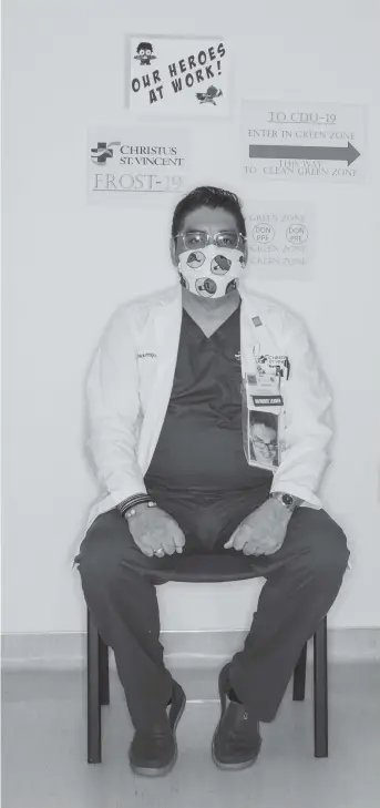  ??  ?? MDominick Armijo, nurse manager, Frost-19 Containmen­t Unit, Christus St. Vincent Regional Medical Center (2020), photo courtesy Eric Cousineau