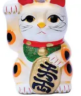  ??  ?? Bringer of fortune: A maneki-neko