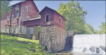  ??  ?? ABOVE: The exterior of the Ogeechee River Mill in Warrenton is a corn mill that has been in operation since 1826. The wooden dam was replaced and the mill moved to its current site in the mid-1930s. It still operates as a mill for local farmers and...