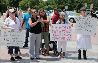  ?? (File Photo/AP/Sue Ogrocki) ?? Participan­ts listen Aug. 19, 2013, during a rally in support of 3-year-old baby Veronica; Veronica’s biological father, Dusten Brown; and the Indian Child Welfare Act in Oklahoma City.