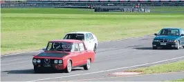  ??  ?? The Fishers on the track in the Alfa and the BMW.
Photo:ROBIN LOCK