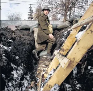  ?? CP PHOTO ?? High school student Dylan Ferris, pictured in the trench he built in his backyard, in Edmonton, Alta., Thursday.