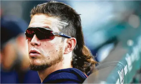  ?? Karen Warren / Staff photograph­er ?? Colby Rasmus sported a mullet during his time with the Astros.