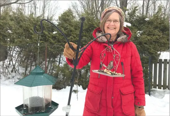  ?? MATTHEW MCCULLY ?? St. Francis Valley Naturalist­s’ Club member Sheila Maclean and her husband Brian Talbot have filled their feeders and are ready to participat­e in the Great Backyard Bird Count, taking place throughout the weekend.