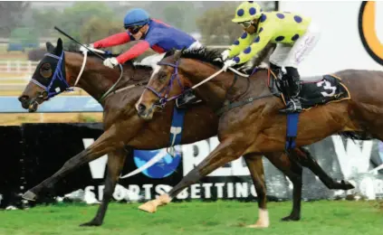  ?? Picture: JC Photograph­ic ?? BEFORE THE STORM: Sean Tarry-trained Silver God and apprentice jockey Luke Ferraris, left, snatch victory in the fourth race at Turffontei­n on Saturday. Rule The Night and Muzi Yeni are second.