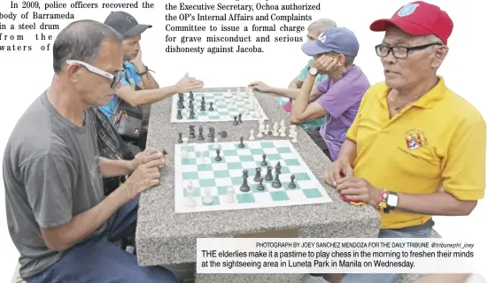  ?? PHOTOGRAPH BY JOEY SANCHEZ MENDOZA FOR THE DAILY TRIBUNE @tribunephl_joey ?? THE elderlies make it a pastime to play chess in the morning to freshen their minds at the sightseein­g area in Luneta Park in Manila on Wednesday.