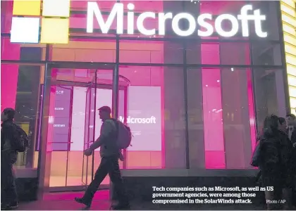  ?? Photo / AP ?? Tech companies such as Microsoft, as well as US government agencies, were among those compromise­d in the SolarWinds attack.