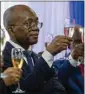  ?? RAMON ESPINOSA / AP ?? Michel Patrick Boisvert, who was named interim prime minister by the cabinet of outgoing Prime Minister Ariel Henry, toasts Thursday during the swearing-in ceremony of the transition­al council tasked with selecting Haiti’s new prime minister and cabinet in Port-auPrince, Haiti.
