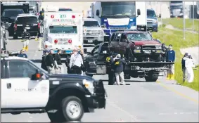  ?? AP/ERIC GAY ?? Officials remove the vehicle Mark Anthony Conditt was driving from the scene after one of his own bombs exploded inside as police approached Wednesday in Round Rock, Texas.