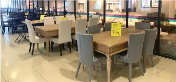  ??  ?? Dining table sets on sale during this promotion.