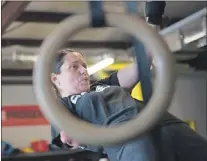  ?? AP PHOTO/LISA MARIE PANE ?? Cindy Martinez performs a body row exercise.