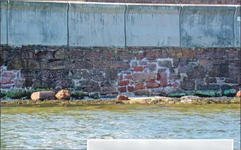  ?? Photo by Jim Arnold ?? The repairs to the Whiting Bay wall, using original sandstone, can be clearly seen.