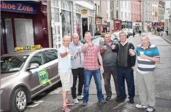  ??  ?? Members of the Tralee Taxi Associatio­n protesting on Bridge Street, Tralee in July against Kerry County Council’s plans for new taxi ranks in the town. (Pictured) Brendan O’Sullivan, Dermot Ryan, Anthony Dineen, Frank Ryle, Kevin Coffey and Michael...