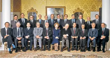  ??  ?? Armstrong, standing, right, and the Conservati­ve Cabinet of 1983 with the Prime Minister Margaret Thatcher in the centre