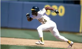  ?? Photograph: Jeff Carlick/MLB Photos/Getty Images ?? Rickey Henderson’s speed and reflexes made him one of the greatest players of his generation.