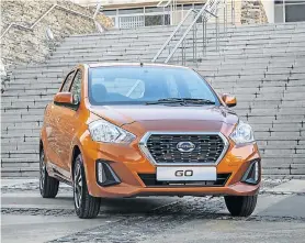  ?? Pictures: MOTORPRESS ?? FRESHER LOOK: A redesigned front grille, and front and rear bumpers, give the updated Go a fresh appeal