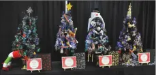  ?? Photos by Matthew Liebenberg/Prairie Post ?? Decorated mini Christmas trees are displayed at the Swift Current Museum's Festival of Minis.