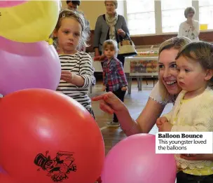  ??  ?? Balloon Bounce This youngster loved the balloons