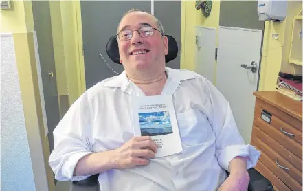  ?? Vernon Oickle ?? Richard Daury proudly displays his book, My Piece of Paradise in South West Port Mouton, that was launched on July 11 at Queens Manor in Liverpool.