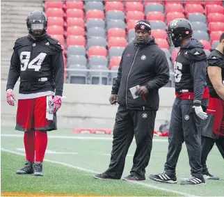  ?? ASHLEY FRASER ?? Ottawa Redblacks defensive lineman Cleyon Laing, left, has a notorious history with Edmonton Eskimos quarterbac­k Mike Reilly, having been involved in injuring him in 2013, 2014 and 2015.