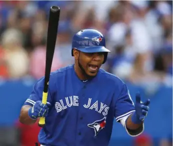  ?? CARLOS OSORIO/TORONTO STAR ?? The Jays’ Edwin Encarnacio­n is all smiles after slamming a solo homer in the sixth against Arizona on Wednesday.