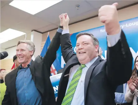  ?? GAVIN YOUNG ?? Jason Kenney celebrates with Dave Rodney, who stepped aside for the UCP leader, after winning the Calgary-Lougheed byelection Thursday.