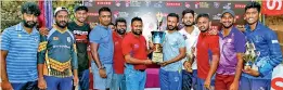  ?? ?? Men's winners Fabric Lanka, the skipper of the team being handed over the trophy