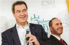  ?? Foto: Matthias Balk, dpa ?? Markus Söder und Hubert Aiwanger geben Gas. Am Wochenende sollen die Koalitions­verhandlun­gen abgeschlos­sen sein.