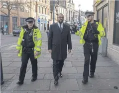  ?? ?? Home Secretary James Cleverly with police officers. File picture: Carl Court/getty Images