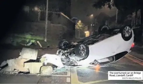  ?? SOUTH WALES POLICE ?? The overturned car on Bridge Road, Llandaff, Cardiff