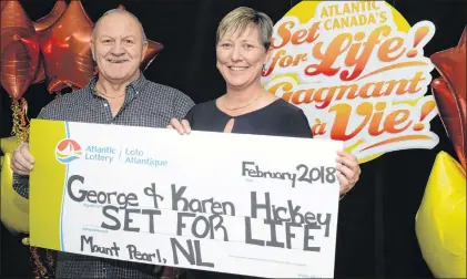  ?? JOE GIBBONS/THE TELEGRAM ?? Winners George and Karen Hickey of Mount Pearl at the Atlantic Lottery office in St. John’s Wednesday.