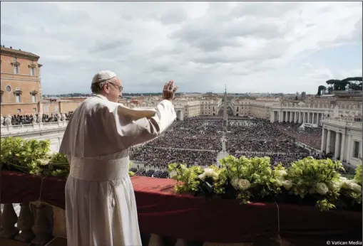  ?? The Associated Press ?? ST. PETER’S SQUARE: Pope Francis delivers the “Urbi et Orbi” (“To the City and to the World”) blessing at the end of Easter Sunday Mass in St. Peter’s Square at the Vatican. Francis reflected on the power of Christiani­ty’s core belief — that Jesus rose...