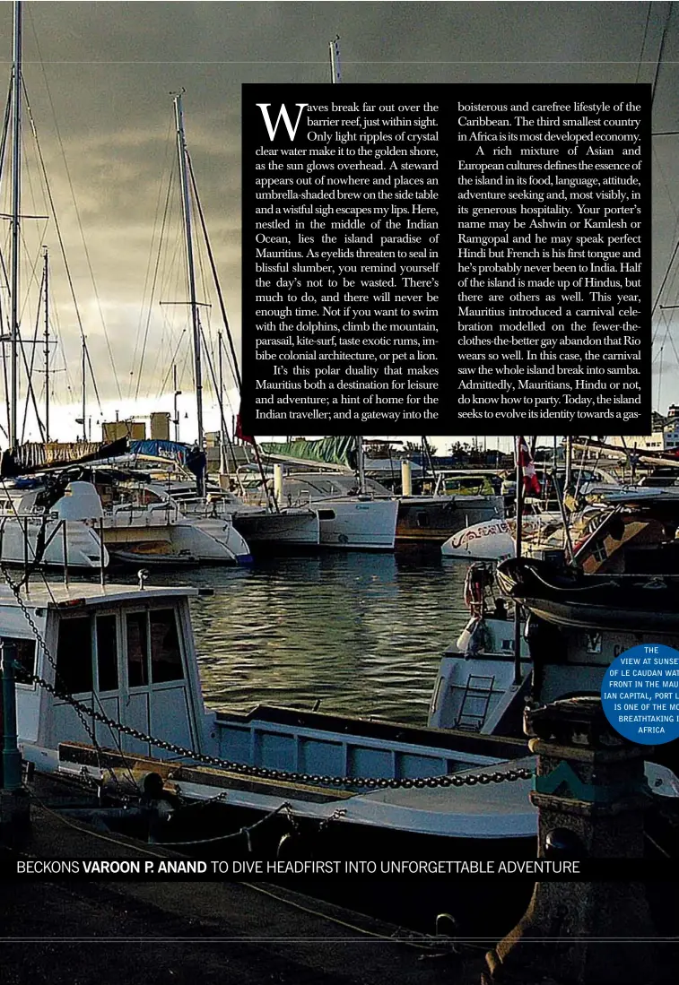  ??  ?? THE VIEW AT SUNSET OF LE CAUDAN WATERFRONT IN THE MAURITIAN CAPITAL, PORT LOUIS, IS ONE OF THE MOST BREATHTAKI­NG IN
AFRICA