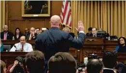  ?? J. SCOTT APPLEWHITE/AP ?? Acting Attorney General Matthew Whitaker is sworn in to testify before the House Judiciary Committee by Chairman Jerrold Nadler, D-N.Y., right, in Washington on Friday.