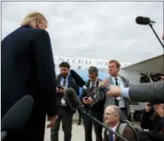  ?? EVAN VUCCI - THE ASSOCIATED PRESS ?? President Donald Trump listens to a question about the missing Saudi journalist Jamal Khashoggi after landing at Cincinnati Municipal Lunken Airport, Friday in Cincinnati, Ohio.