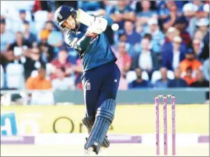  ?? AFP ?? England’s Joe Root hits a four with the last shot of the third one-day internatio­nal against India at Headingley Stadium in Leeds, northern England, on Tuesday.