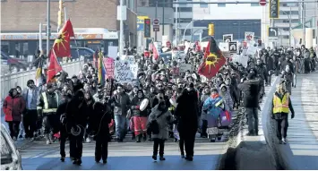  ?? JOHN WOODS/ THE CANADIAN PRESS ?? Family and supporters of Thelma Favel, Tina Fontaine’s great- aunt and the woman who raised her, marched Friday, in Winnipeg the day after the jury delivered a not- guilty verdict in the 2nd degree murder trial of Raymond Cormier.