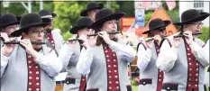  ?? Arnold Gold / Hearst Connecticu­t Media ?? The Connecticu­t Patriots Fife & Drum Corps march in the Independen­ce Day Parade in Madison on July 4.