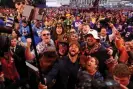  ?? Photograph: Gregory Shamus/Getty Images ?? Caleb Williams celebrates with fans after being selected first overall by the Chicago Bears during the first round of the 2024 NFL draft at Campus Martius Park and Hart Plaza.