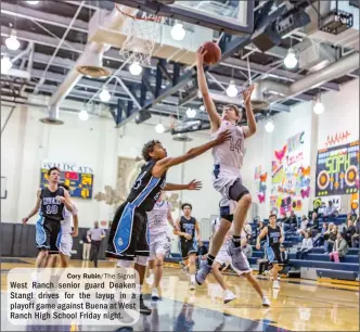  ?? Cory Rubin/The Signal ?? West Ranch senior guard Deaken Stangl drives for the layup in a playoff game against Buena at West Ranch High School Friday night.