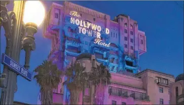  ?? Paul Hiffmeyer Associated Press ?? THEME PARKS’ send-off campaigns may include VIP after-hours parties on the last day of a ride. Above, the Twilight Zone Tower of Terror, which was closed last year at Disney’s California Adventure in Anaheim.