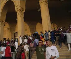  ?? AP ?? Worshipper­s pose for a selfie after performing Eid Al Fitr morning prayers at the Mohammad Al Amin Mosque in Beirut