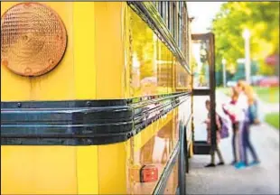  ?? GETTY ?? Advocates say the Education Department should provide buses for all students in foster care so they won’t have to switch schools because they can’t get to class.