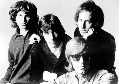  ?? [PHOTO PROVIDED BY ELEKTRA RECORDS] ?? The Doors — from left, singer Jim Morrison, drummer John Densmore, keyboardis­t Ray Manzarek and lead guitarist Robby Krieger — pose for a publicity photo in the 1960s. Fifty years ago, the band released its self-titled debut album.