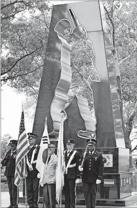  ?? WILLENS/THE ASSOCIATED PRESS] [KATHY ?? A ceremony was held Thursday at the New York Korean War Memorial in Battery Park to commemorat­e the 64th anniversar­y of the Korean War armistice. The event was hosted by the nonprofit Korea Society.