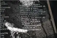  ?? Astrid Riecken / Washington Post ?? The first seven-ton panel with 450 names was placed at the Korean War Veterans Memorial. Ninety-nine more panels will be placed in the coming months to honor those who died in that war.