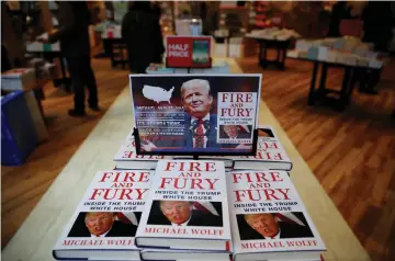  ?? (Phil Noble/Reuters) ?? COPIES OF Michael Wolff’s book ‘Fire And Fury’ are seen on sale inside a branch of the Waterstone­s book store in Liverpool, England, last week.