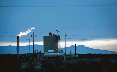  ?? Jon Shapley / Staff file photo ?? Natural gas flaring occurs in Pecos County near Fort Stockton in 2019. The oil industry has long contended with the problem of flaring, the burning of excess natural gas produced as a byproduct of crude production.