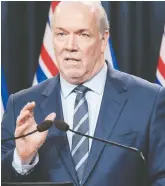  ?? B.C. GOVERNMENT ?? Retired doctor Vic Wood shares his pandemic advice to B.C. Premier John Horgan, pictured.