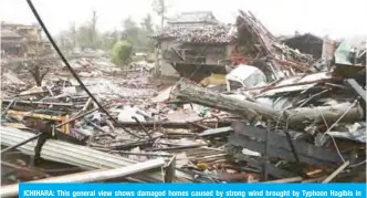  ??  ?? ICHIHARA: This general view shows damaged homes caused by strong wind brought by Typhoon Hagibis in Ichihara, Chiba prefecture yesterday. — AFP